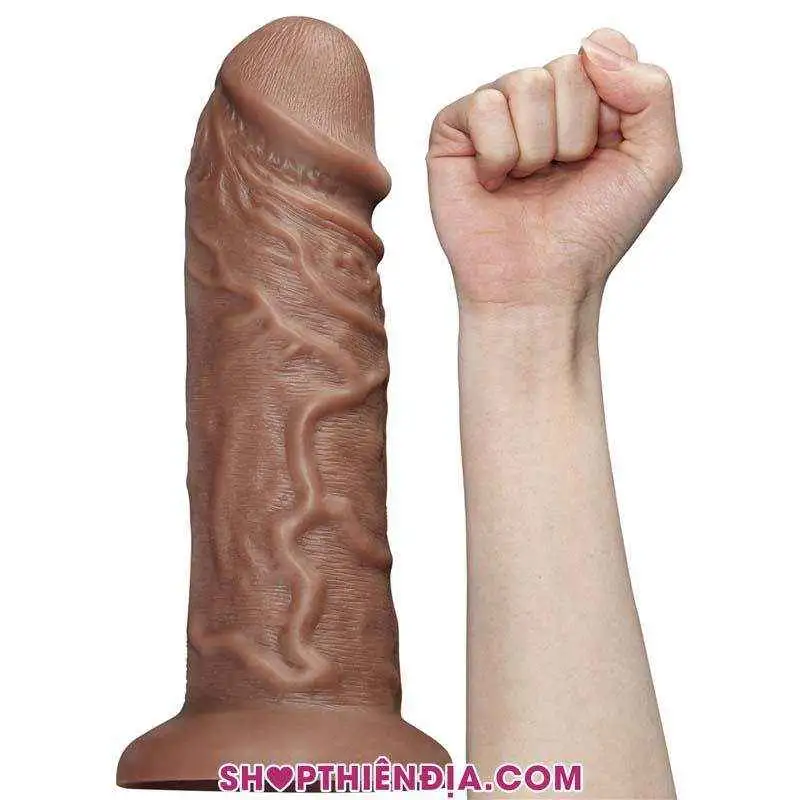 Dương vật giả siêu to gắn tường Chubby đặt cạnh cẳng tay phải