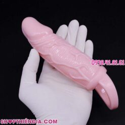 Bao cao su đôn có quai đeo và rung MEN đặt trên lòng bàn tay